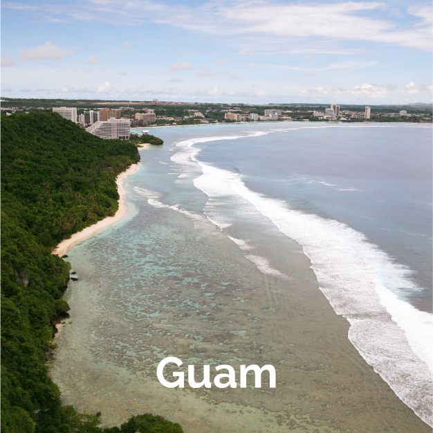 Guam oceanside view with the city in the distance.